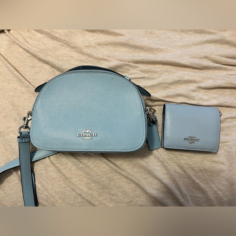 Blue coach purse. Like new. I am selling both pieces together.